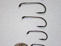 Photo of different size standard Fishing Hooks Photo of different size standard Fishing Hooks