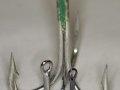 Photo of Treble Fishing Hooks in different sizes. Photo of Treble Fishing Hooks in different sizes.