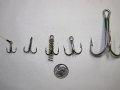 Photo of different size treble Fishing Hooks. Photo of different size treble Fishing Hooks.